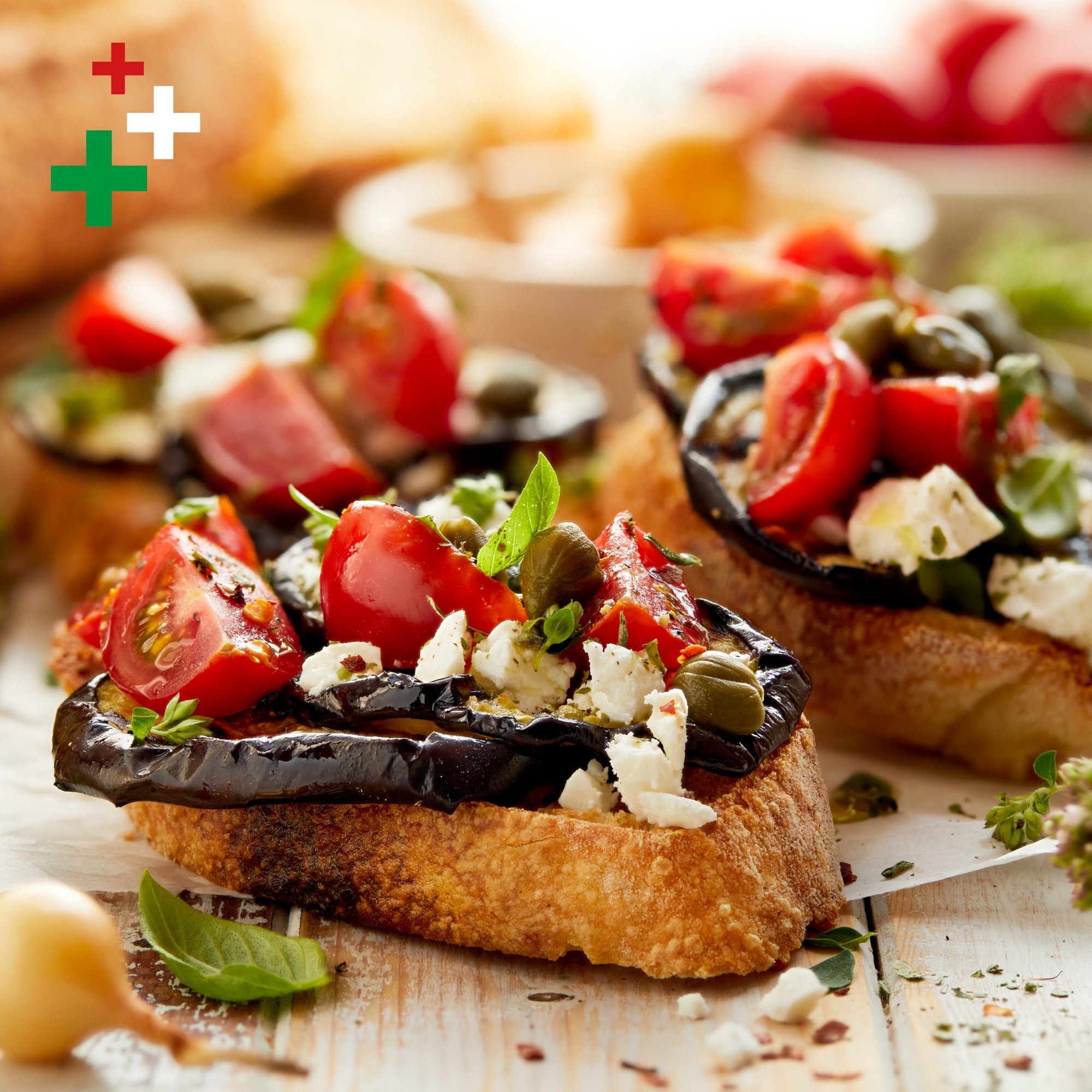 Bruschetta pomodorini, formaggio fresco e melanzane grigliate